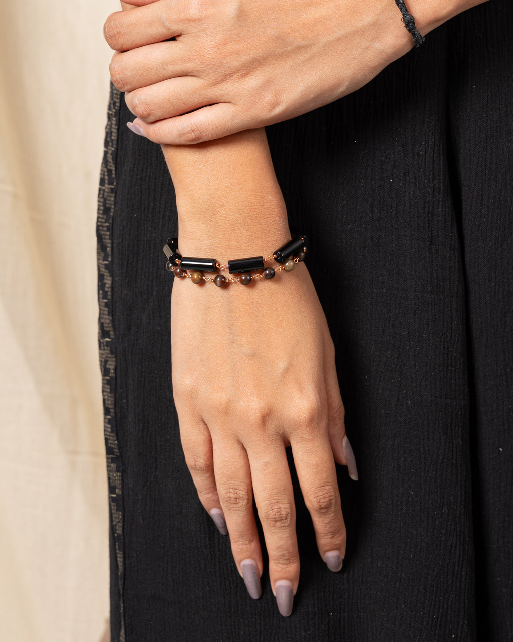 Tiger Eye and Cylindrical Black Bead Bracelet